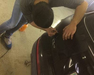 Процесс тонировки задних фар на Audi Q7